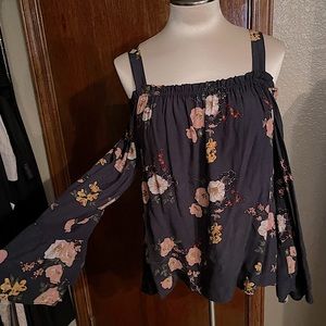 Strapless floral top w bell sleeve.
